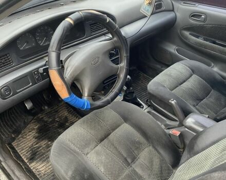 Синий Киа Сефия, объемом двигателя 1.5 л и пробегом 200 тыс. км за 710 $, фото 3 на Automoto.ua