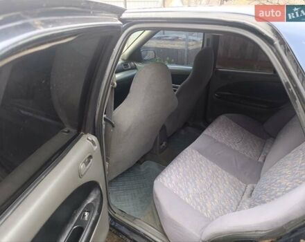 Синій Кіа Сефія, об'ємом двигуна 1.79 л та пробігом 235 тис. км за 1000 $, фото 5 на Automoto.ua