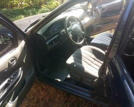 Синий Киа Сефия, объемом двигателя 1.8 л и пробегом 233 тыс. км за 1250 $, фото 6 на Automoto.ua