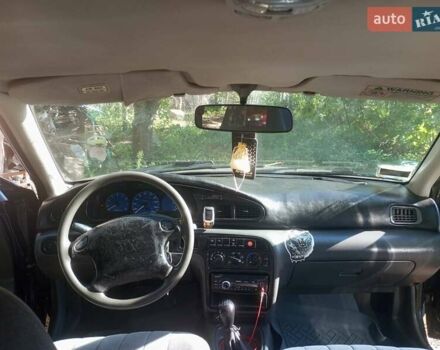 Синий Киа Сефия, объемом двигателя 1.8 л и пробегом 233 тыс. км за 1250 $, фото 5 на Automoto.ua