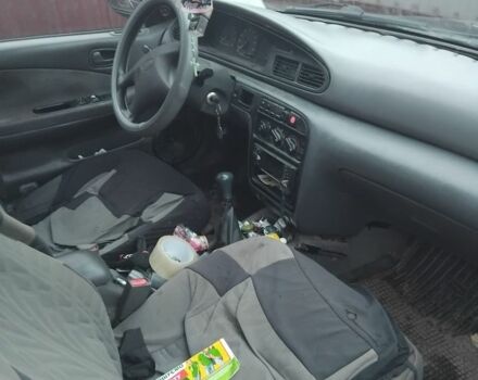 Синий Киа Сефия, объемом двигателя 0 л и пробегом 446 тыс. км за 952 $, фото 4 на Automoto.ua