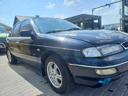 Синий Киа Сефия, объемом двигателя 1.5 л и пробегом 145 тыс. км за 1400 $, фото 1 на Automoto.ua