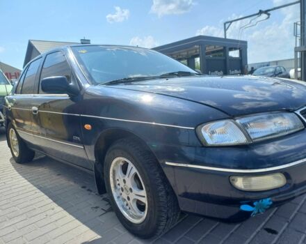 Синій Кіа Сефія, об'ємом двигуна 1.5 л та пробігом 145 тис. км за 1400 $, фото 1 на Automoto.ua