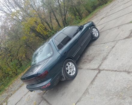 Зеленый Киа Сефия, объемом двигателя 1.5 л и пробегом 333 тыс. км за 1000 $, фото 2 на Automoto.ua