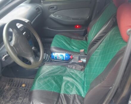 Зеленый Киа Сефия, объемом двигателя 1.5 л и пробегом 333 тыс. км за 1000 $, фото 6 на Automoto.ua