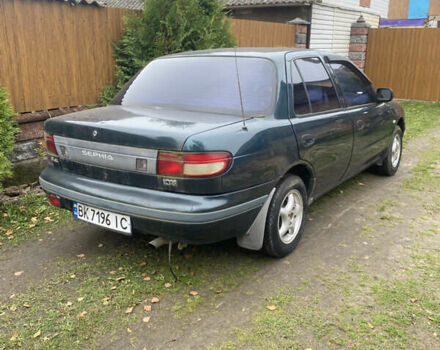 Зеленый Киа Сефия, объемом двигателя 1.6 л и пробегом 320 тыс. км за 870 $, фото 1 на Automoto.ua