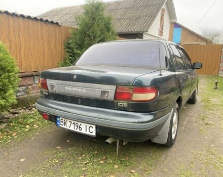 Зеленый Киа Сефия, объемом двигателя 1.6 л и пробегом 320 тыс. км за 870 $, фото 3 на Automoto.ua