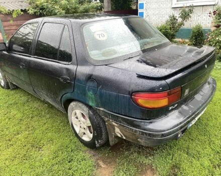 Зеленый Киа Сефия, объемом двигателя 1.6 л и пробегом 300 тыс. км за 700 $, фото 2 на Automoto.ua