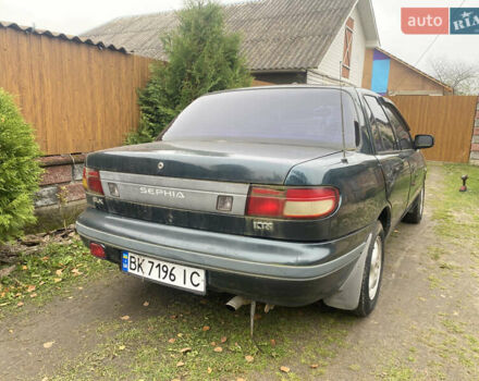 Зеленый Киа Сефия, объемом двигателя 1.6 л и пробегом 320 тыс. км за 870 $, фото 3 на Automoto.ua