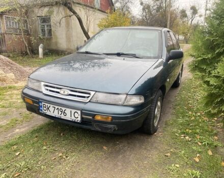 Зеленый Киа Сефия, объемом двигателя 1.6 л и пробегом 320 тыс. км за 870 $, фото 4 на Automoto.ua