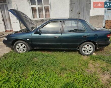 Зелений Кіа Сефія, об'ємом двигуна 1.6 л та пробігом 280 тис. км за 1500 $, фото 30 на Automoto.ua