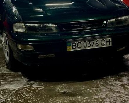 Зеленый Киа Сефия, объемом двигателя 1.5 л и пробегом 318 тыс. км за 1450 $, фото 2 на Automoto.ua