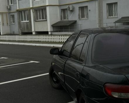 Зеленый Киа Сефия, объемом двигателя 1.6 л и пробегом 320 тыс. км за 1001 $, фото 4 на Automoto.ua