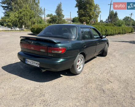 Зелений Кіа Сефія, об'ємом двигуна 1.6 л та пробігом 382 тис. км за 1800 $, фото 1 на Automoto.ua