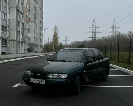 Зеленый Киа Сефия, объемом двигателя 1.6 л и пробегом 320 тыс. км за 1001 $, фото 1 на Automoto.ua