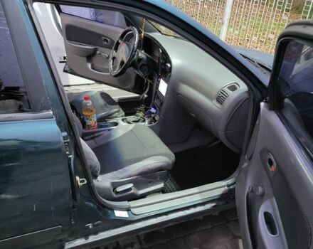 Зелений Кіа Сефія, об'ємом двигуна 1.5 л та пробігом 280 тис. км за 1200 $, фото 10 на Automoto.ua