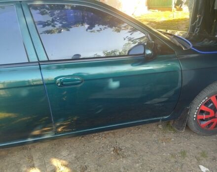 Зеленый Киа Сефия, объемом двигателя 1.5 л и пробегом 292 тыс. км за 3200 $, фото 2 на Automoto.ua