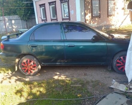 Зеленый Киа Сефия, объемом двигателя 1.5 л и пробегом 292 тыс. км за 3200 $, фото 9 на Automoto.ua