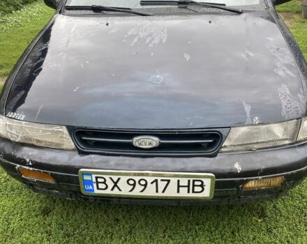 Зеленый Киа Сефия, объемом двигателя 1.6 л и пробегом 300 тыс. км за 700 $, фото 1 на Automoto.ua