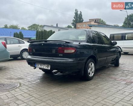 Зелений Кіа Сефія, об'ємом двигуна 1.6 л та пробігом 400 тис. км за 950 $, фото 1 на Automoto.ua