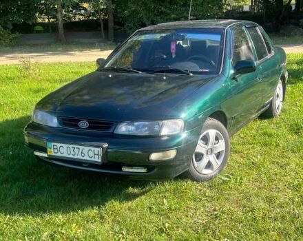 Зелений Кіа Сефія, об'ємом двигуна 1.5 л та пробігом 317 тис. км за 900 $, фото 1 на Automoto.ua