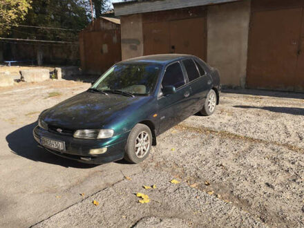 Зеленый Киа Сефия, объемом двигателя 1.5 л и пробегом 225 тыс. км за 1400 $, фото 1 на Automoto.ua