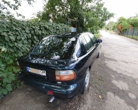 Зелений Кіа Сефія, об'ємом двигуна 1.5 л та пробігом 321 тис. км за 1300 $, фото 1 на Automoto.ua