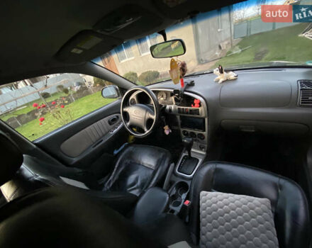 Черный Киа Шума, объемом двигателя 1.6 л и пробегом 308 тыс. км за 3100 $, фото 19 на Automoto.ua