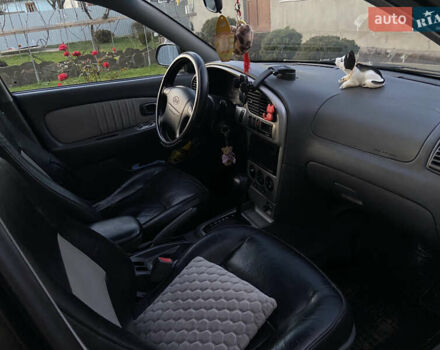 Черный Киа Шума, объемом двигателя 1.6 л и пробегом 308 тыс. км за 3100 $, фото 15 на Automoto.ua