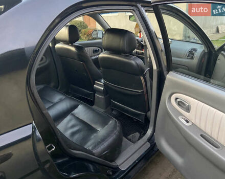 Черный Киа Шума, объемом двигателя 1.6 л и пробегом 308 тыс. км за 3100 $, фото 17 на Automoto.ua