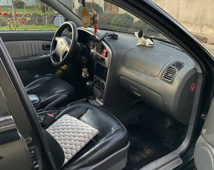 Черный Киа Шума, объемом двигателя 1.6 л и пробегом 308 тыс. км за 3100 $, фото 14 на Automoto.ua