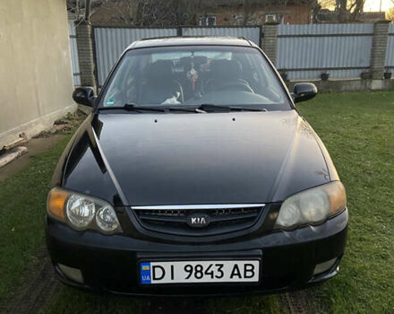 Черный Киа Шума, объемом двигателя 1.6 л и пробегом 308 тыс. км за 3100 $, фото 1 на Automoto.ua