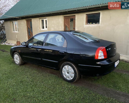 Черный Киа Шума, объемом двигателя 1.6 л и пробегом 308 тыс. км за 3100 $, фото 7 на Automoto.ua