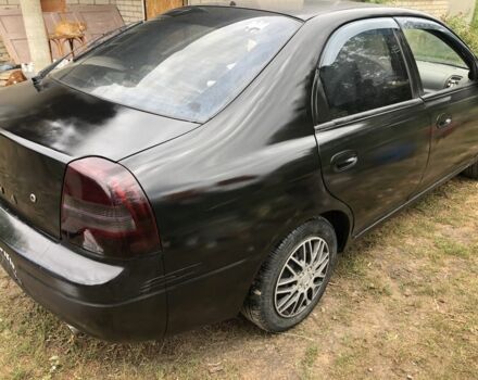 Черный Киа Шума, объемом двигателя 1.6 л и пробегом 267 тыс. км за 2500 $, фото 4 на Automoto.ua