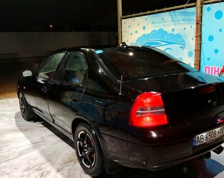 Черный Киа Шума, объемом двигателя 1.5 л и пробегом 235 тыс. км за 2000 $, фото 1 на Automoto.ua