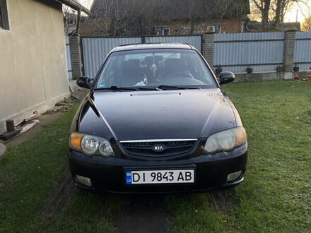 Черный Киа Шума, объемом двигателя 1.6 л и пробегом 308 тыс. км за 3100 $, фото 1 на Automoto.ua