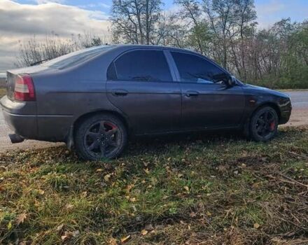 Фиолетовый Киа Шума, объемом двигателя 1.5 л и пробегом 273 тыс. км за 2000 $, фото 3 на Automoto.ua