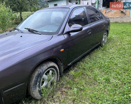 Коричневий Кіа Шума, об'ємом двигуна 1.5 л та пробігом 323 тис. км за 2000 $, фото 3 на Automoto.ua