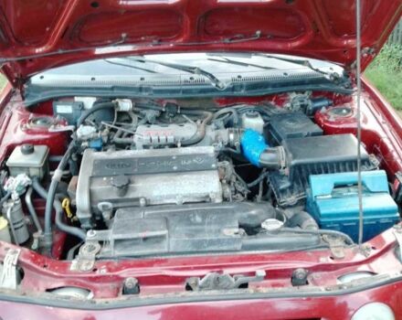 Красный Киа Шума, объемом двигателя 1.5 л и пробегом 170 тыс. км за 1850 $, фото 3 на Automoto.ua