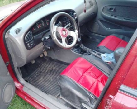 Красный Киа Шума, объемом двигателя 1.5 л и пробегом 170 тыс. км за 1850 $, фото 5 на Automoto.ua