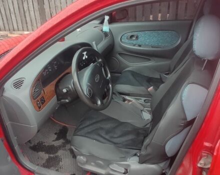 Червоний Кіа Шума, об'ємом двигуна 1.5 л та пробігом 1 тис. км за 1850 $, фото 7 на Automoto.ua