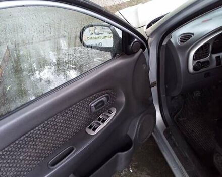 Сірий Кіа Шума, об'ємом двигуна 1.6 л та пробігом 255 тис. км за 1950 $, фото 8 на Automoto.ua