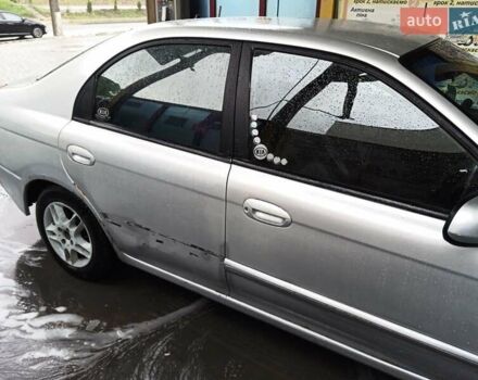 Сірий Кіа Шума, об'ємом двигуна 1.6 л та пробігом 255 тис. км за 1950 $, фото 7 на Automoto.ua