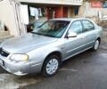 Серый Киа Шума, объемом двигателя 1.6 л и пробегом 171 тыс. км за 2950 $, фото 1 на Automoto.ua