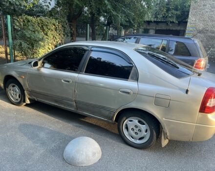 Серый Киа Шума, объемом двигателя 1.5 л и пробегом 200 тыс. км за 1790 $, фото 3 на Automoto.ua