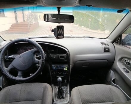 Сірий Кіа Шума, об'ємом двигуна 1.6 л та пробігом 300 тис. км за 2700 $, фото 6 на Automoto.ua