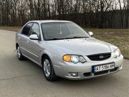 Серый Киа Шума, объемом двигателя 1.8 л и пробегом 320 тыс. км за 2700 $, фото 1 на Automoto.ua