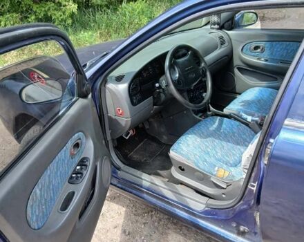 Синий Киа Шума, объемом двигателя 1.5 л и пробегом 400 тыс. км за 1150 $, фото 2 на Automoto.ua
