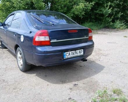 Синий Киа Шума, объемом двигателя 1.5 л и пробегом 400 тыс. км за 1150 $, фото 1 на Automoto.ua