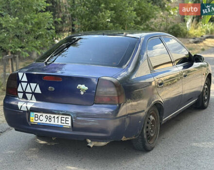 Синій Кіа Шума, об'ємом двигуна 1.5 л та пробігом 300 тис. км за 1600 $, фото 5 на Automoto.ua